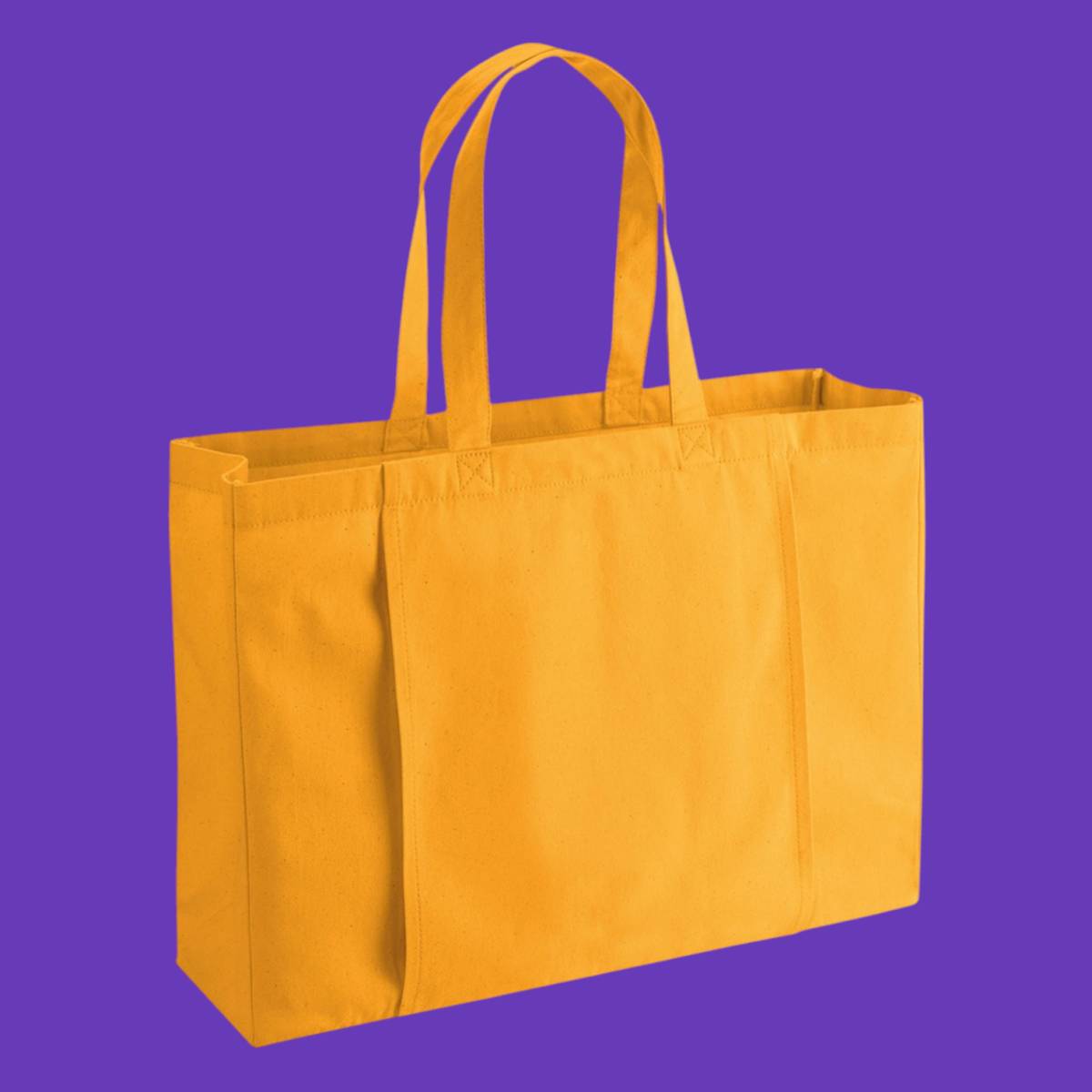 An large amber tote bag featuring a slot on the side perfect for a yoga mat
