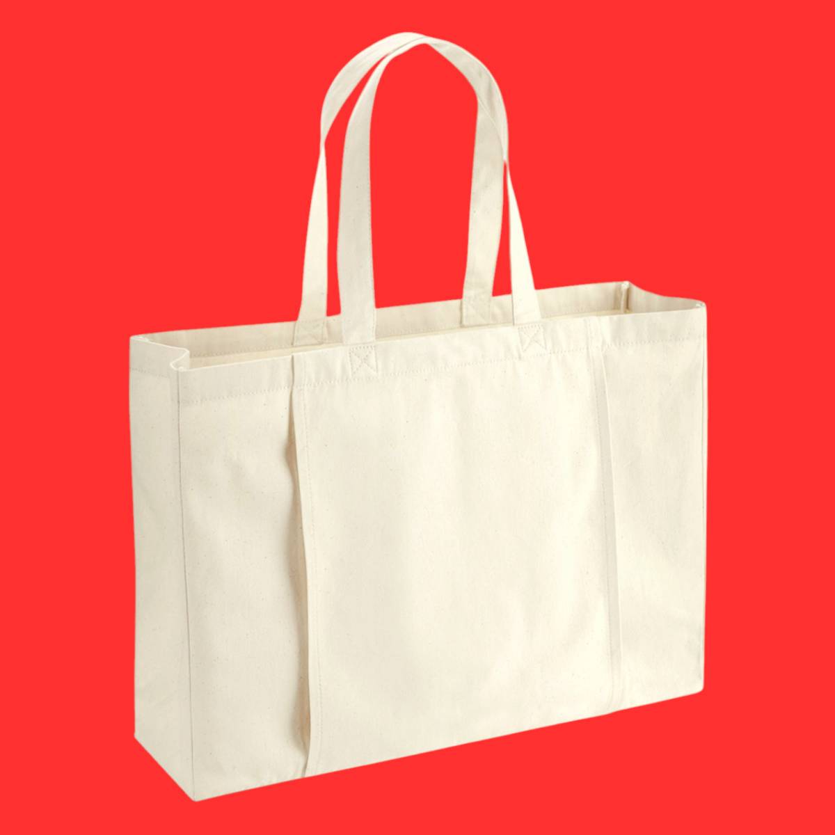 A large, natural coloured tote bag with an sleeve on the side designed for a yoga mat